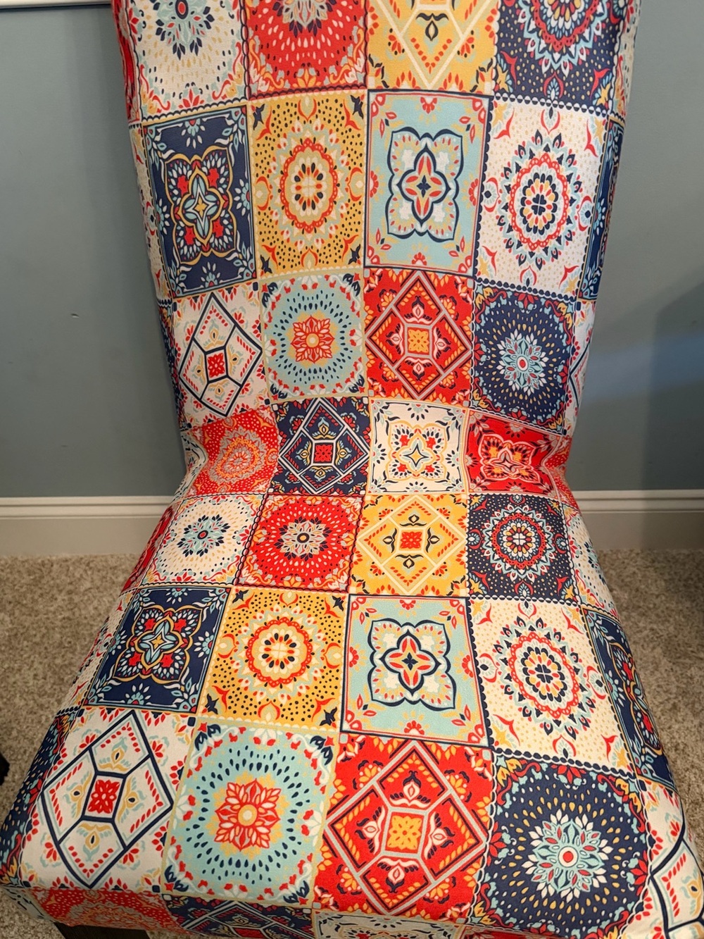 Set of 4 bold colored, mandala chair covers! Never used. Stretch to fit